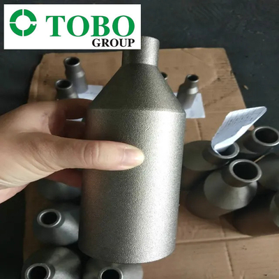 Ti Gr7 2" de las colocaciones ASTM B363 de la tubería de acero de la aleación del titanio x 1" entrerrosca del macho de estampar de la aleación del titanio de SCH10S x SCH40S
